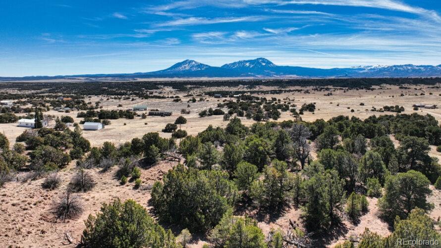 127 Navajo Ranch Walsenburg, CO 81089 - Photo 3 of 18 a view of a lake with a mountain