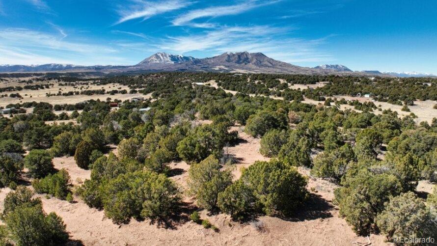 127 Navajo Ranch Walsenburg, CO 81089 - Photo 5 of 18 a view of a city with mountains in the background