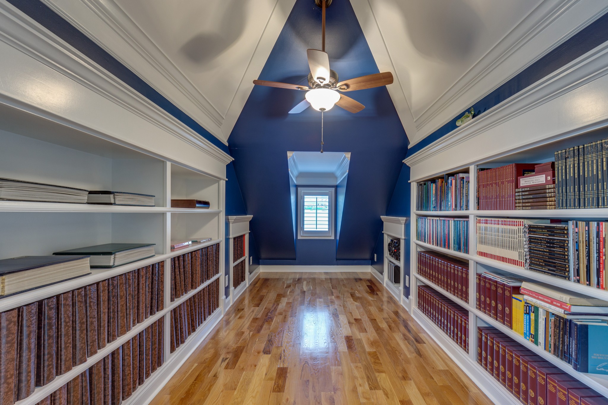 1052 Fitzroy Circle Spring Hill, TN 37174 - Photo 32 of 44 a view of a hallway with wooden floor and staircase