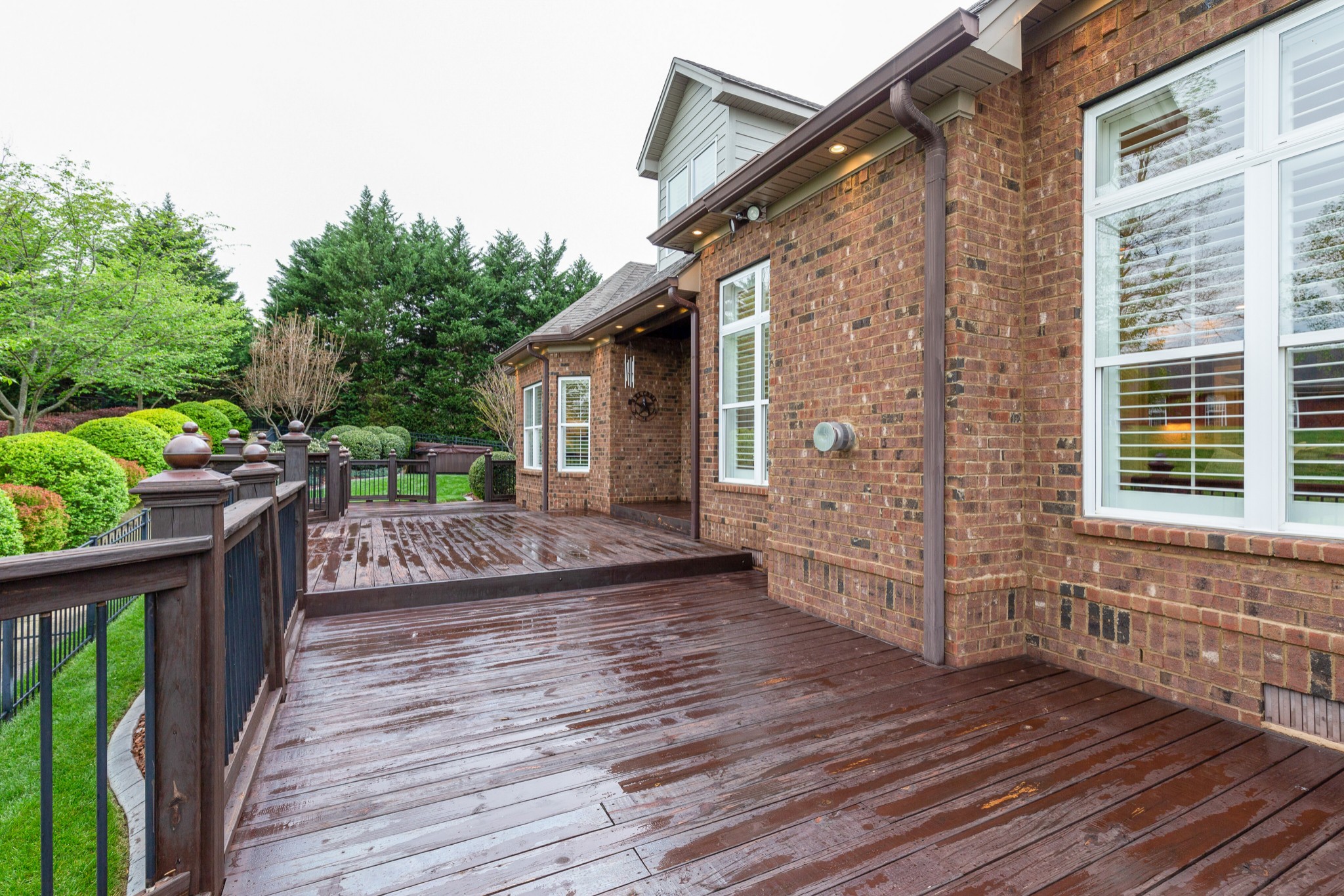 1052 Fitzroy Circle Spring Hill, TN 37174 - Photo 39 of 44 a porch with seating space and hardwood floor