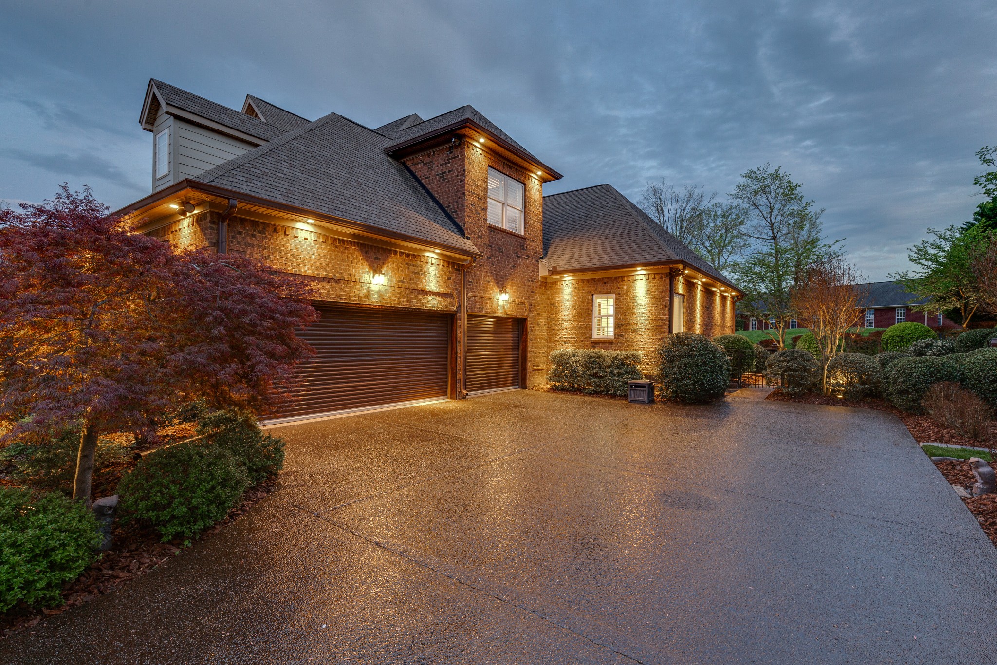 1052 Fitzroy Circle Spring Hill, TN 37174 - Photo 41 of 44 a yellow house with trees in front of it