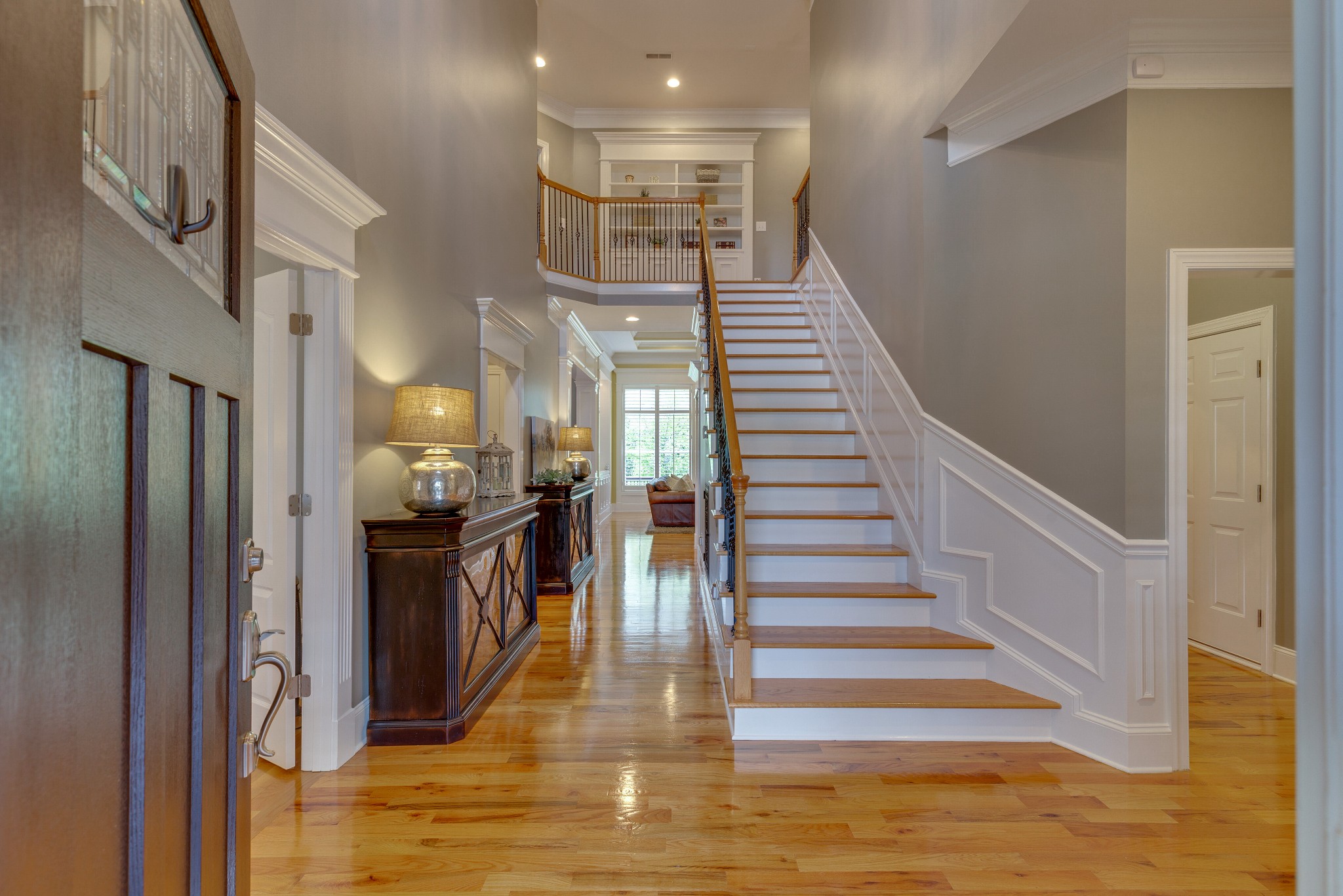 1052 Fitzroy Circle Spring Hill, TN 37174 - Photo 7 of 44 a view of entryway and hall with wooden floor