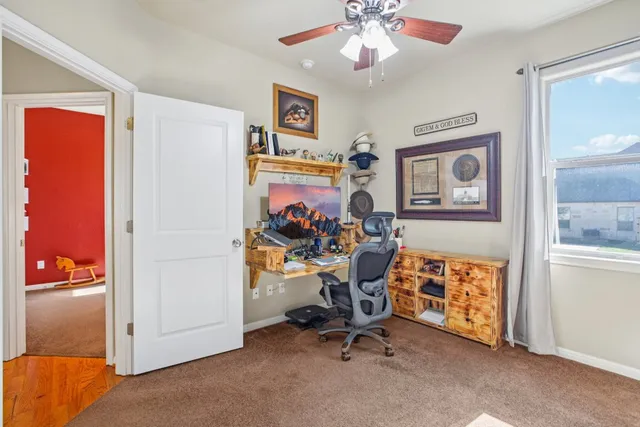 a bedroom with furniture and a chandelier