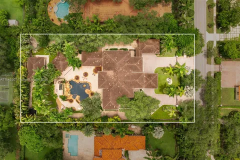 an aerial view of residential house with outdoor space