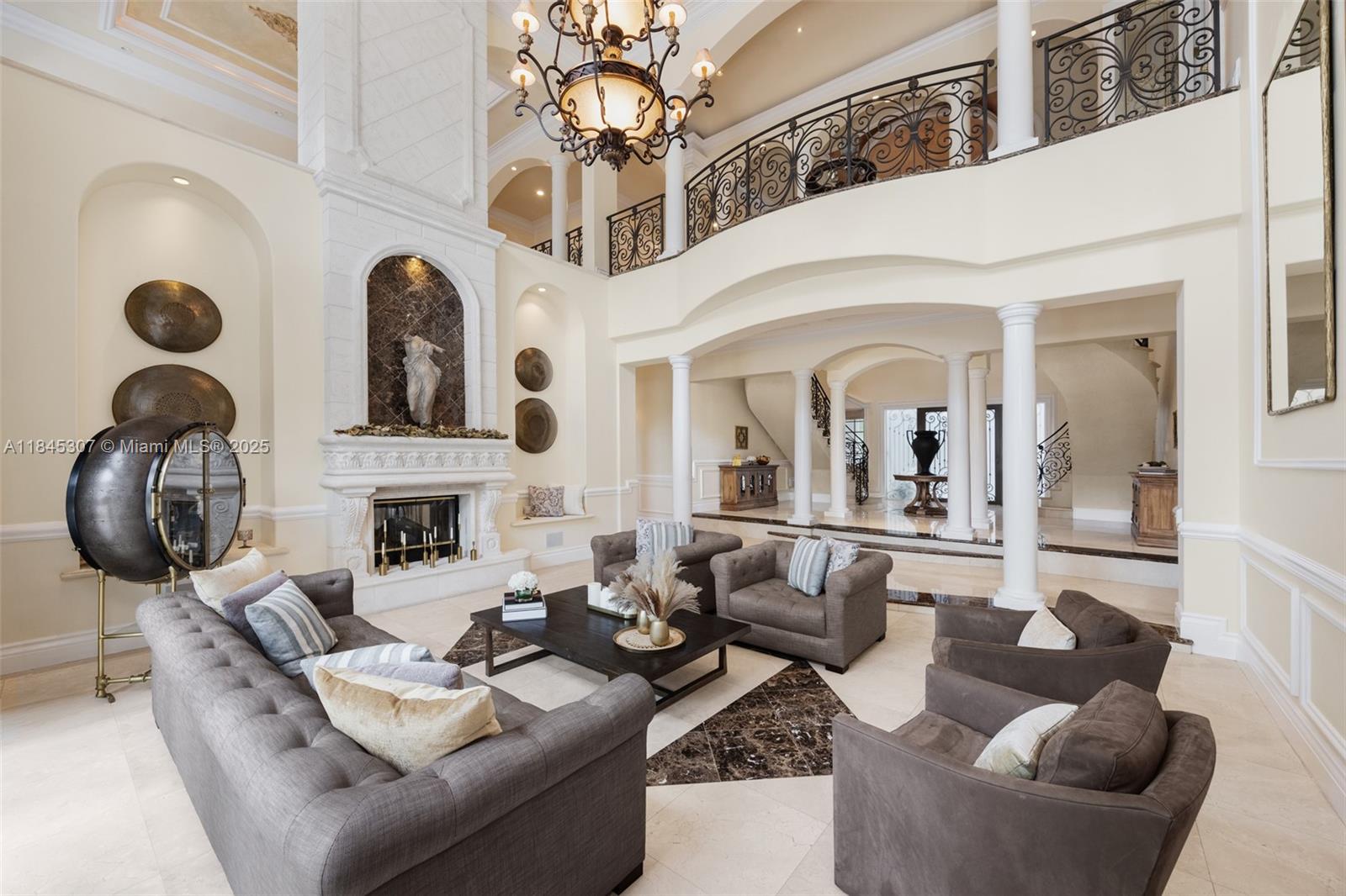 0 7245 Southwest 104th Street Pinecrest, FL 33156 - Photo 26 of 74 a living room with furniture a fireplace and decor