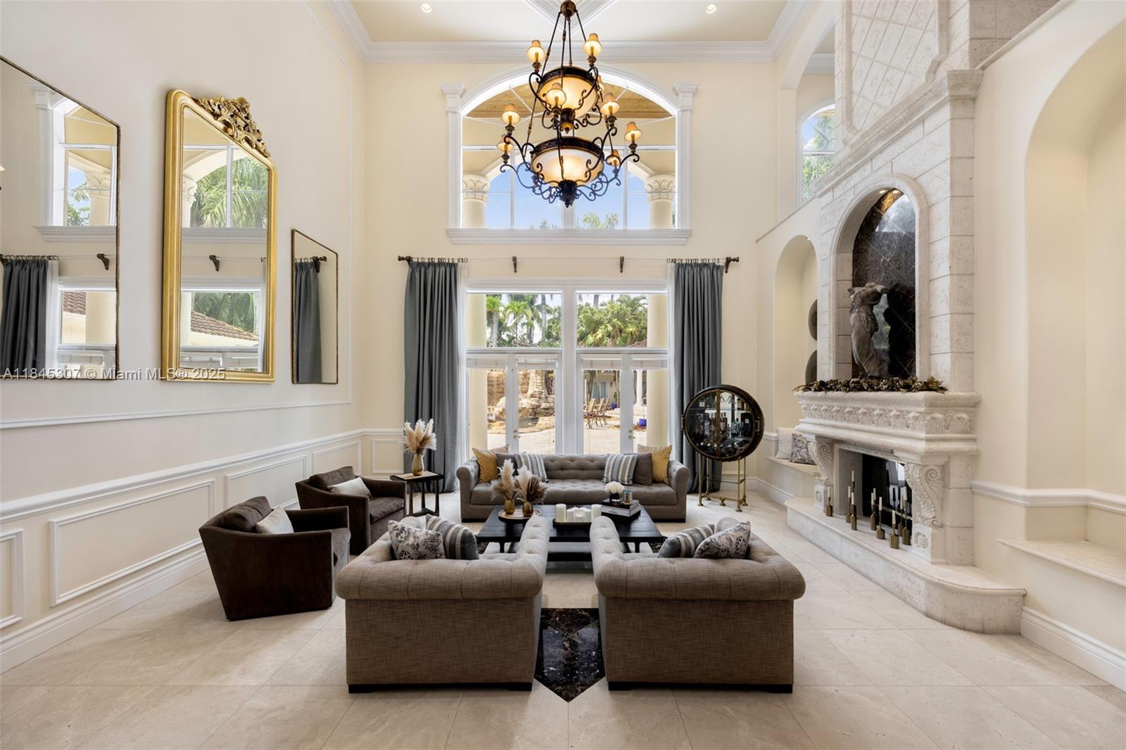 0 7245 Southwest 104th Street Pinecrest, FL 33156 - Photo 28 of 74 a living room with furniture fireplace and flat screen tv