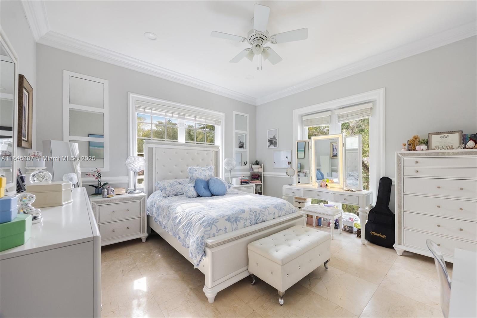 0 7245 Southwest 104th Street Pinecrest, FL 33156 - Photo 42 of 74 a bedroom with a bed and furniture