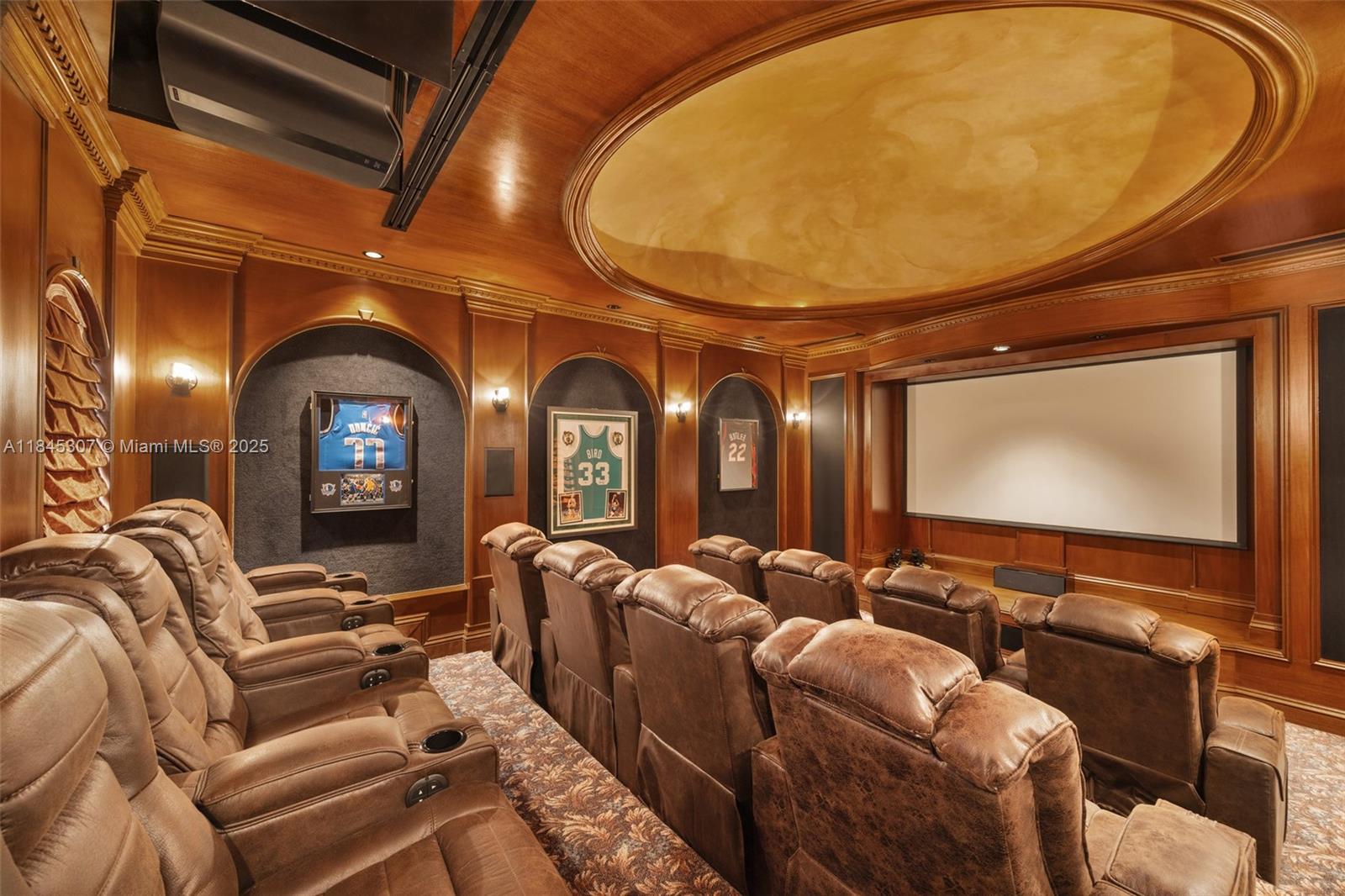 0 7245 Southwest 104th Street Pinecrest, FL 33156 - Photo 50 of 74 a living room with furniture a flat screen tv and a potted plant