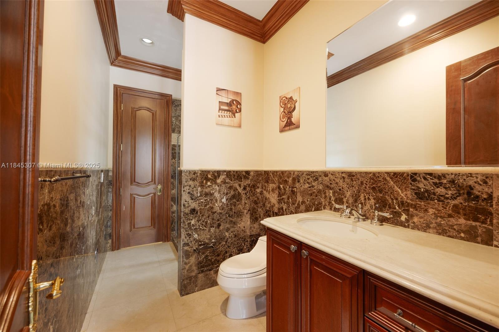 0 7245 Southwest 104th Street Pinecrest, FL 33156 - Photo 53 of 74 a bathroom with a sink a toilet and shower