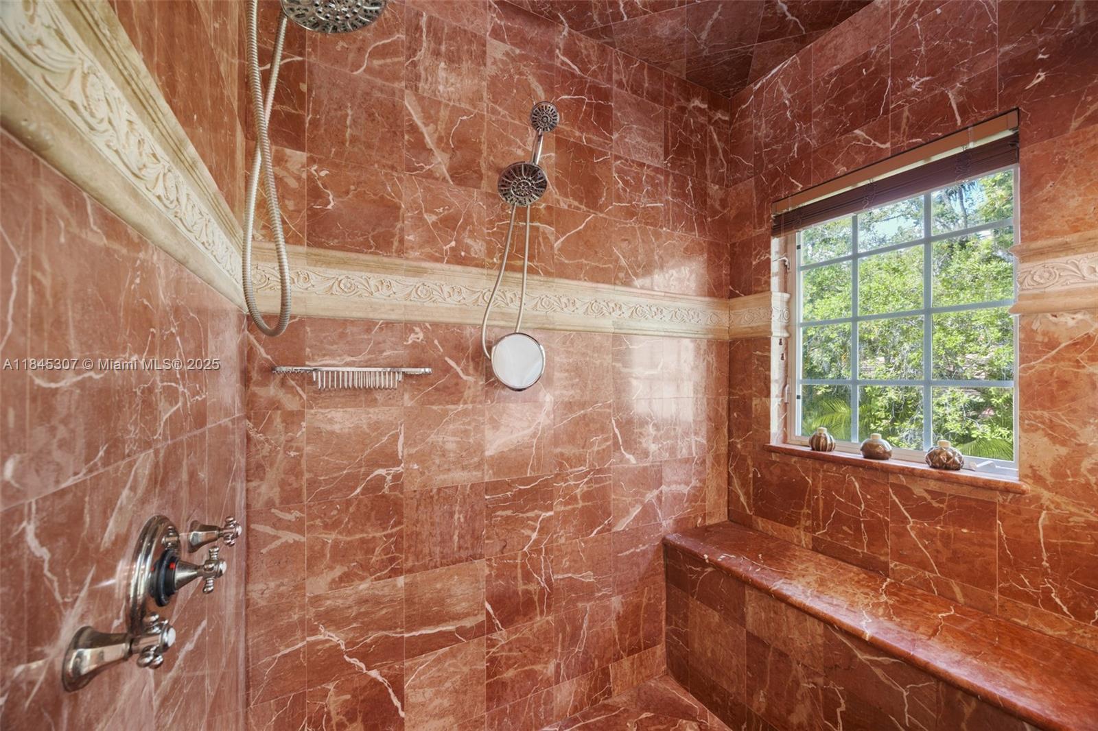 0 7245 Southwest 104th Street Pinecrest, FL 33156 - Photo 62 of 74 a bathroom with a bathtub and shower