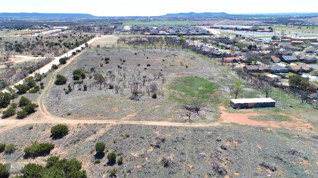 7801 Old Forrest Hill Road Abilene, TX 79606 - Photo 5 of 13 a view of a lake with mountains in the background