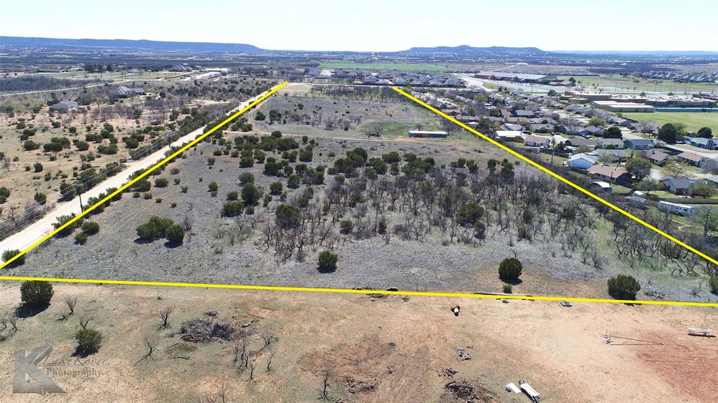 7801 Old Forrest Hill Road Abilene, TX 79606 - Photo 6 of 13 a view of a swimming pool with a lake