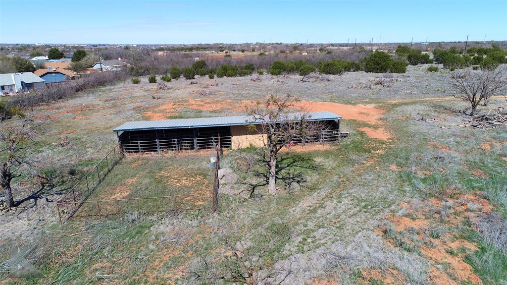 7801 Old Forrest Hill Road Abilene, TX 79606 - Photo 10 of 13 an aerial view of a house with a yard and lake view