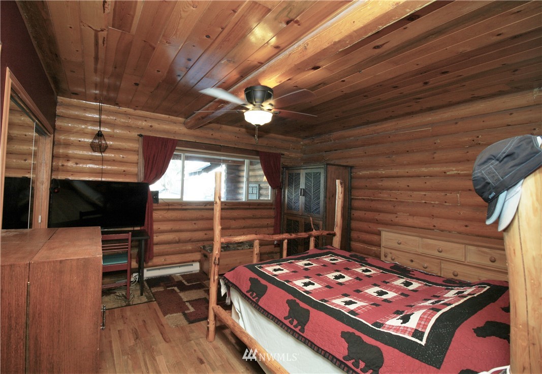 1304 Radio Road Ellensburg, WA 98926 - Photo 13 of 26 a view of a room with wooden floor and furniture