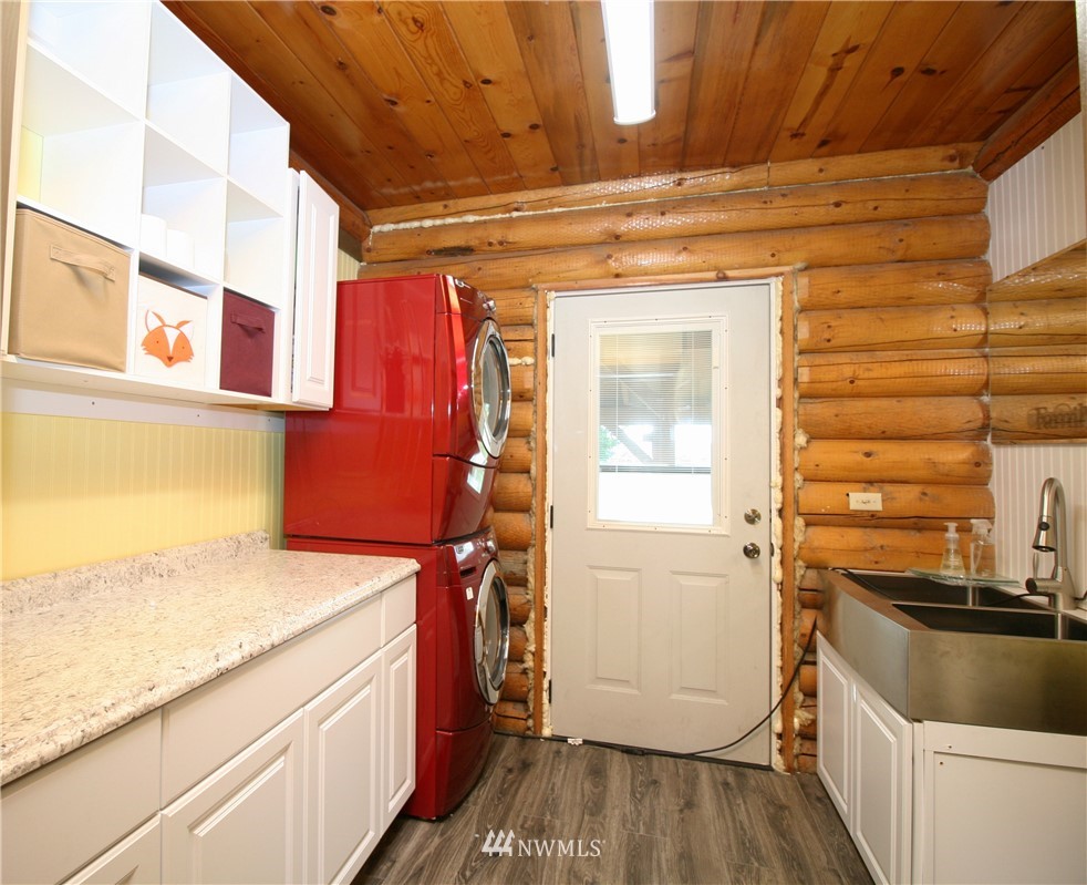1304 Radio Road Ellensburg, WA 98926 - Photo 14 of 26 a kitchen with a sink and a refrigerator