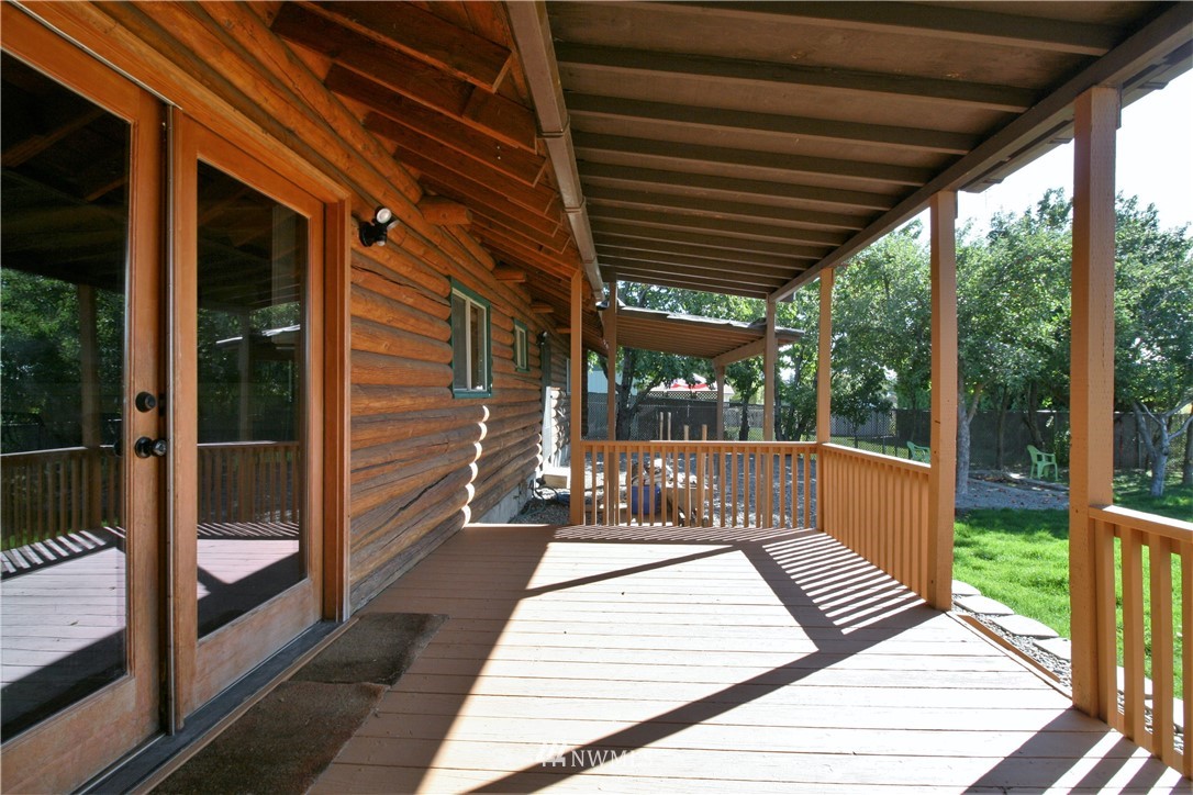 1304 Radio Road Ellensburg, WA 98926 - Photo 21 of 26 a view of a patio with a table and chairs next to a yard