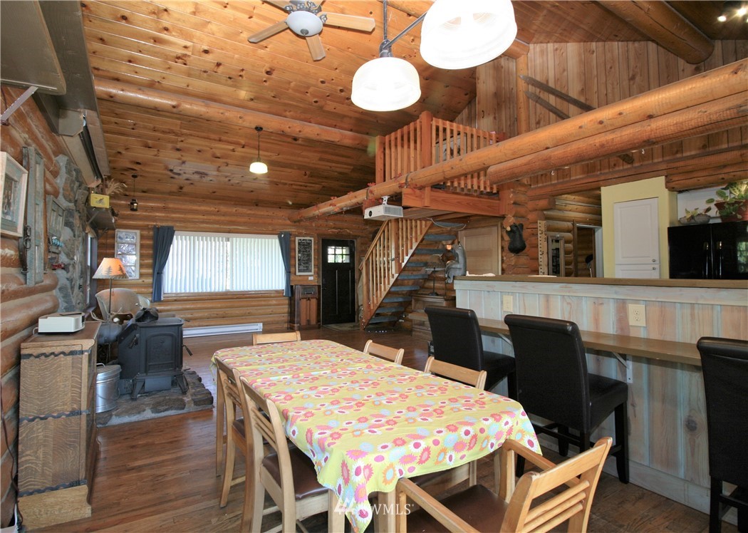 1304 Radio Road Ellensburg, WA 98926 - Photo 7 of 26 a dining room with a table and chairs