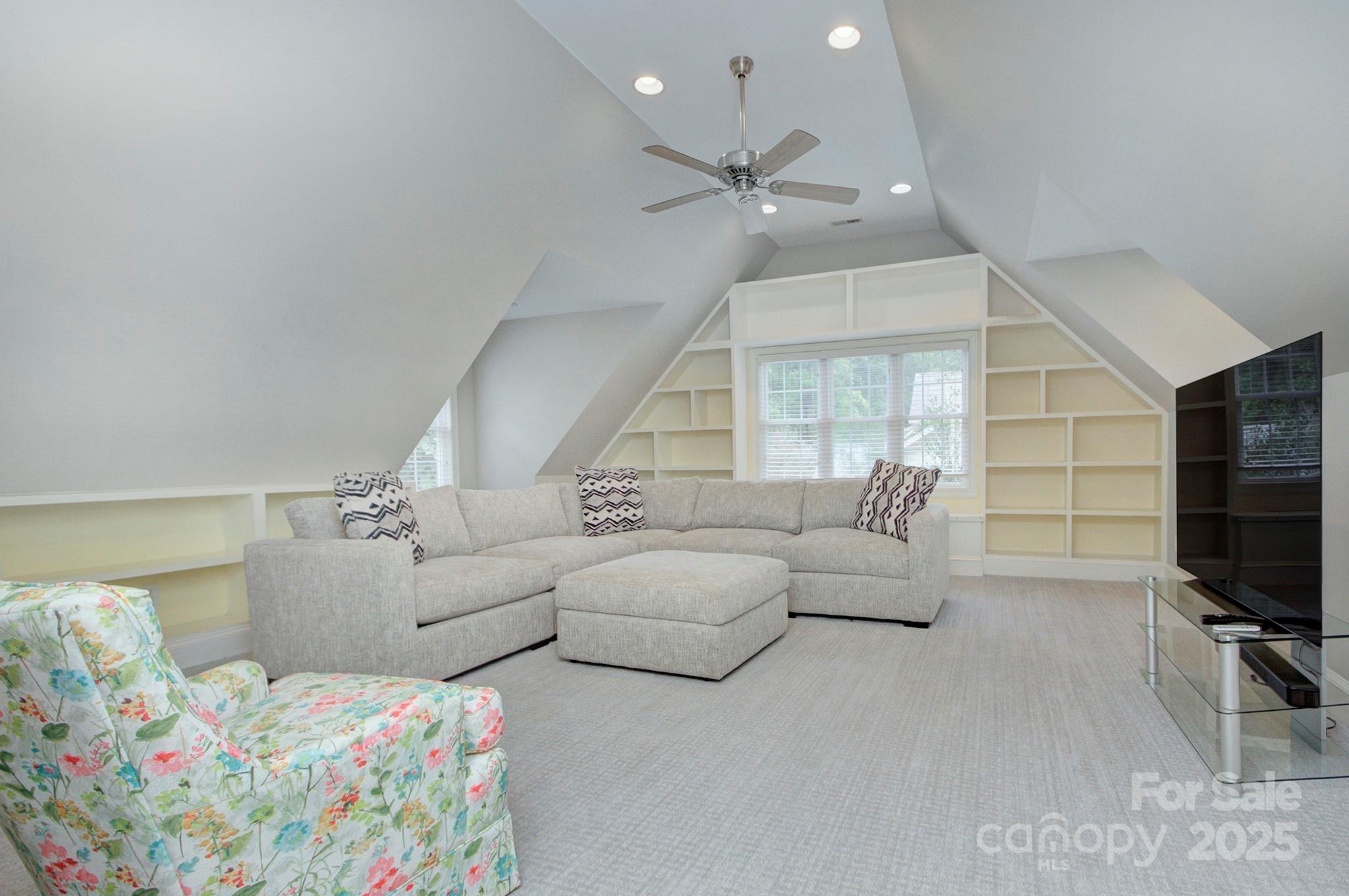 823 Sedgefield Road Charlotte, NC 28209 - Photo 35 of 38 a living room with furniture and a flat screen tv