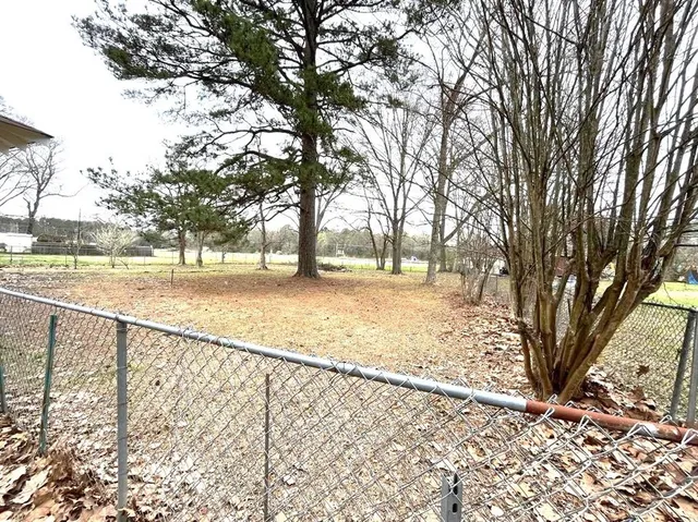 a view of yard with trees