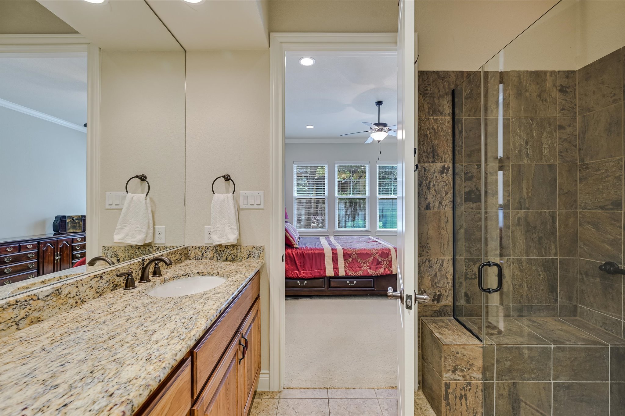 103 Rivalto Circle, Unit 1 Lakeway, TX 78734 - Photo 12 of 34 Main bathroom with walk in shower