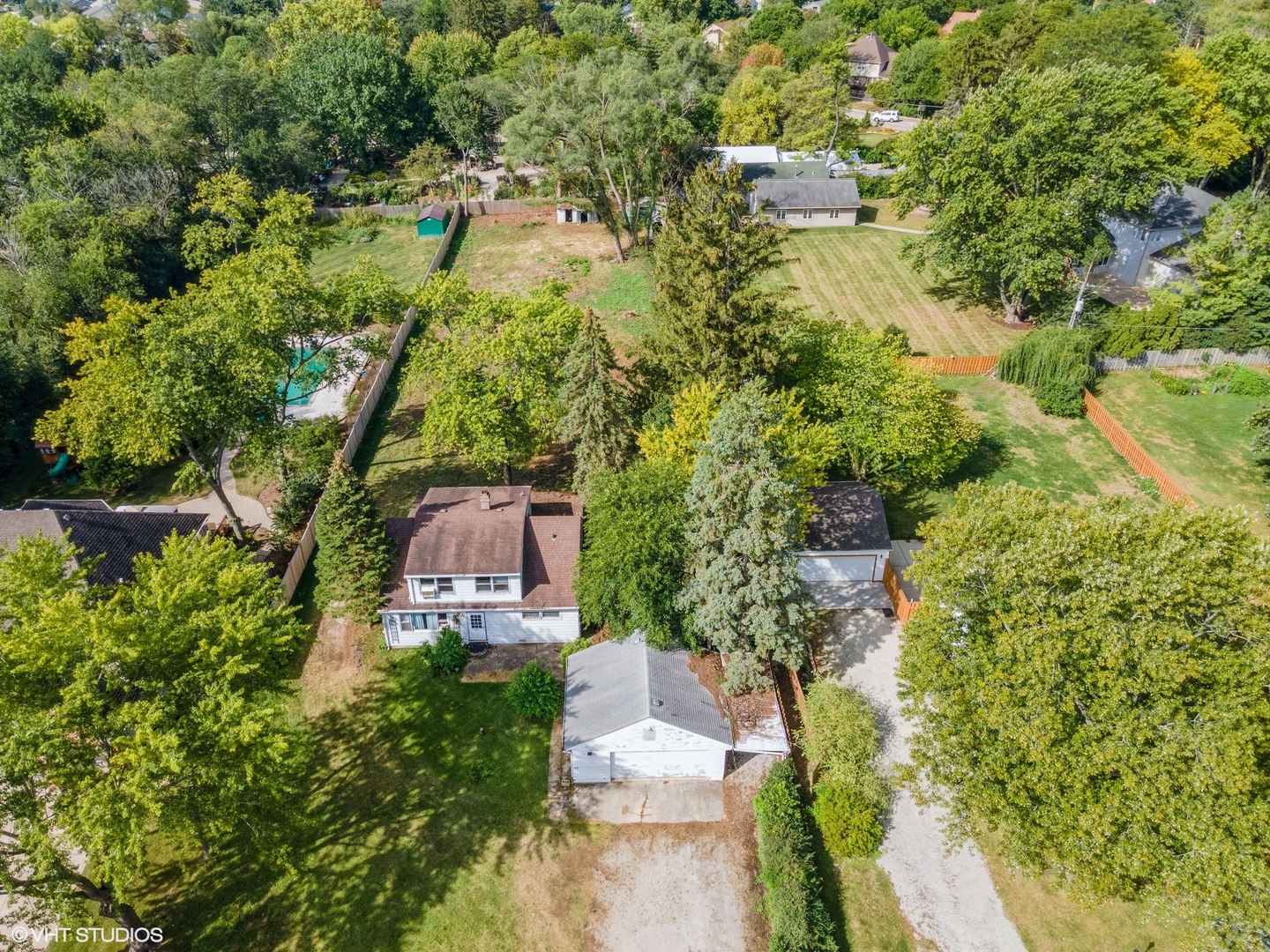 5S578 Tuthill Road Naperville, IL 60563 - Photo 17 of 23 an aerial view of a house with a yard basket ball court and outdoor seating