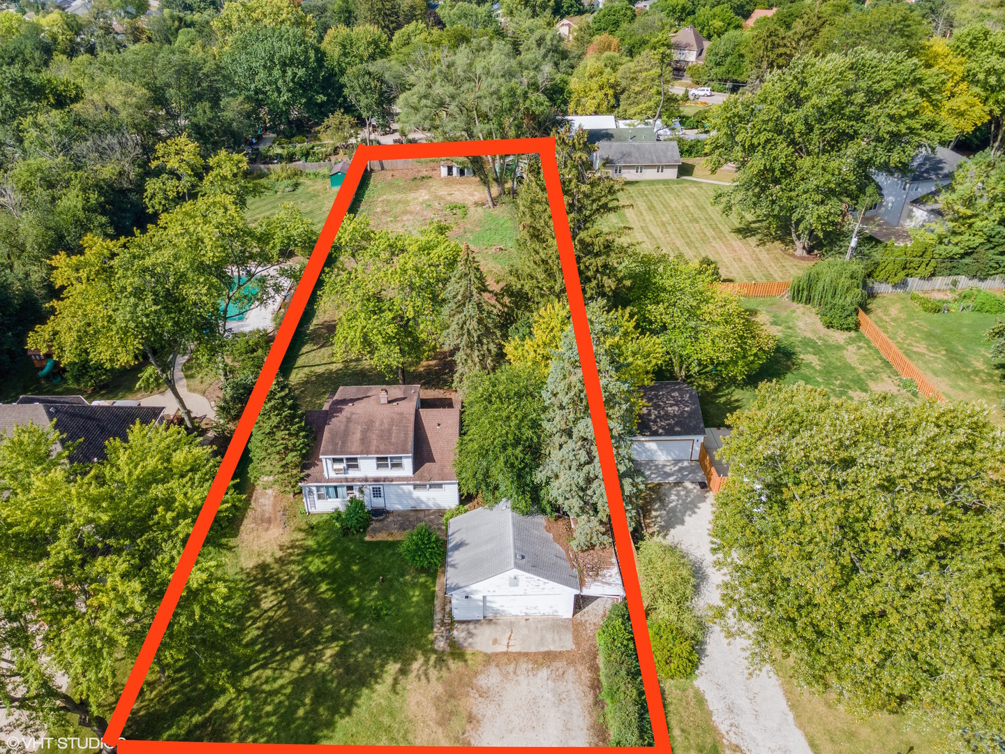 5S578 Tuthill Road Naperville, IL 60563 - Photo 18 of 23 an aerial view of a house with a yard and potted plants