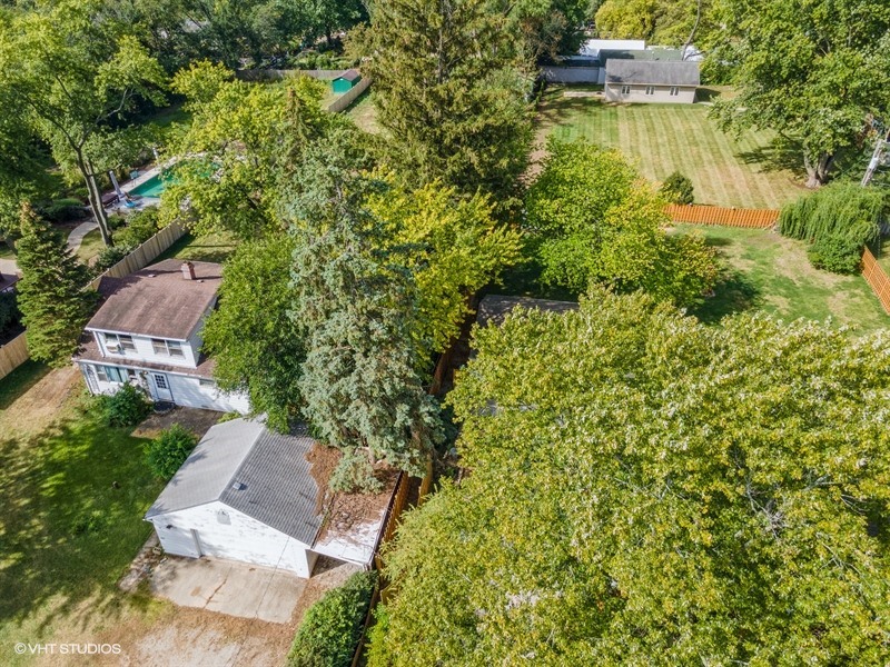 5S578 Tuthill Road Naperville, IL 60563 - Photo 19 of 23 an aerial view of residential house with outdoor space and trees all around