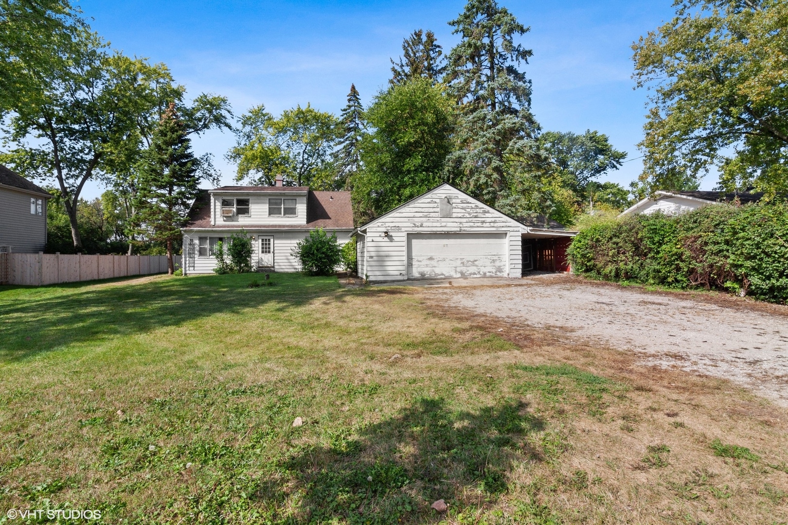 5S578 Tuthill Road Naperville, IL 60563 - Photo 4 of 23 a front view of a house with a yard