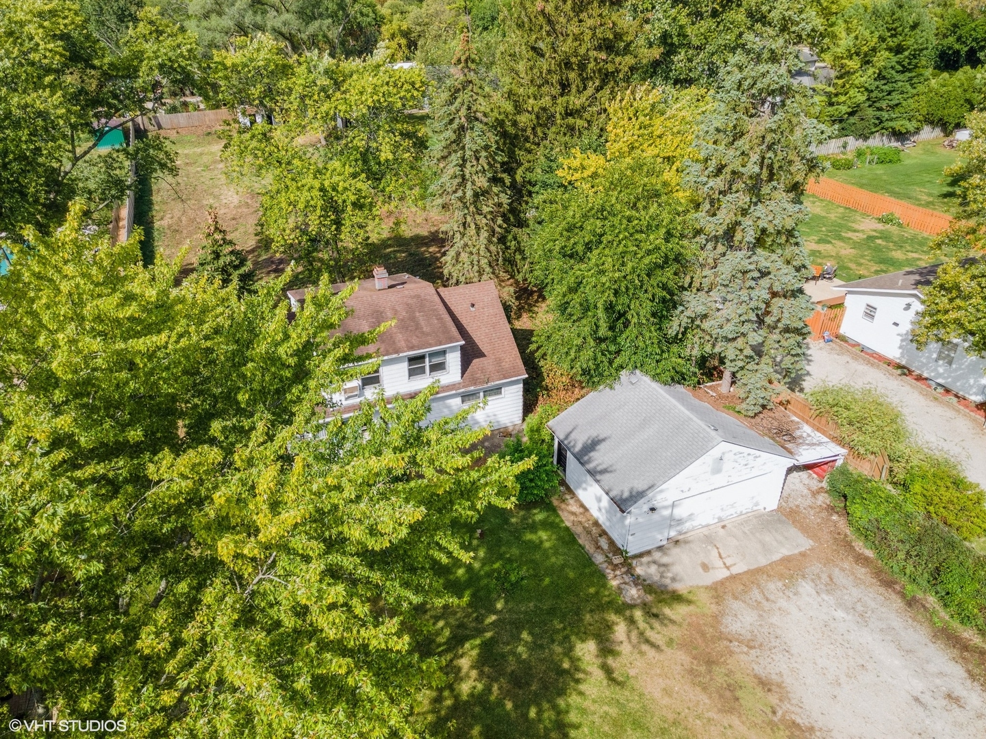 5S578 Tuthill Road Naperville, IL 60563 - Photo 6 of 23 an aerial view of a house with a yard and garden