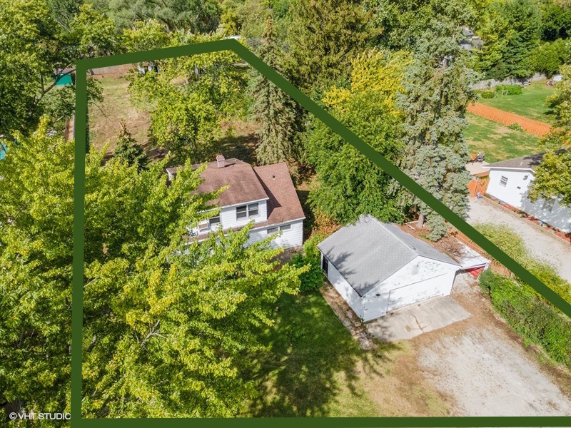 5S578 Tuthill Road Naperville, IL 60563 - Photo 7 of 23 an aerial view of a house with yard swimming pool and outdoor seating