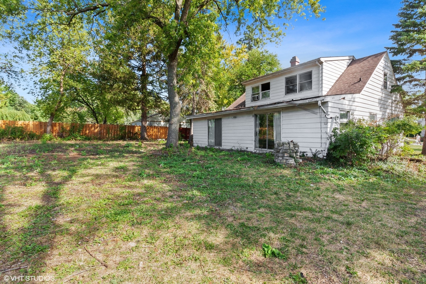 5S578 Tuthill Road Naperville, IL 60563 - Photo 10 of 23 a front view of house with yard and trees