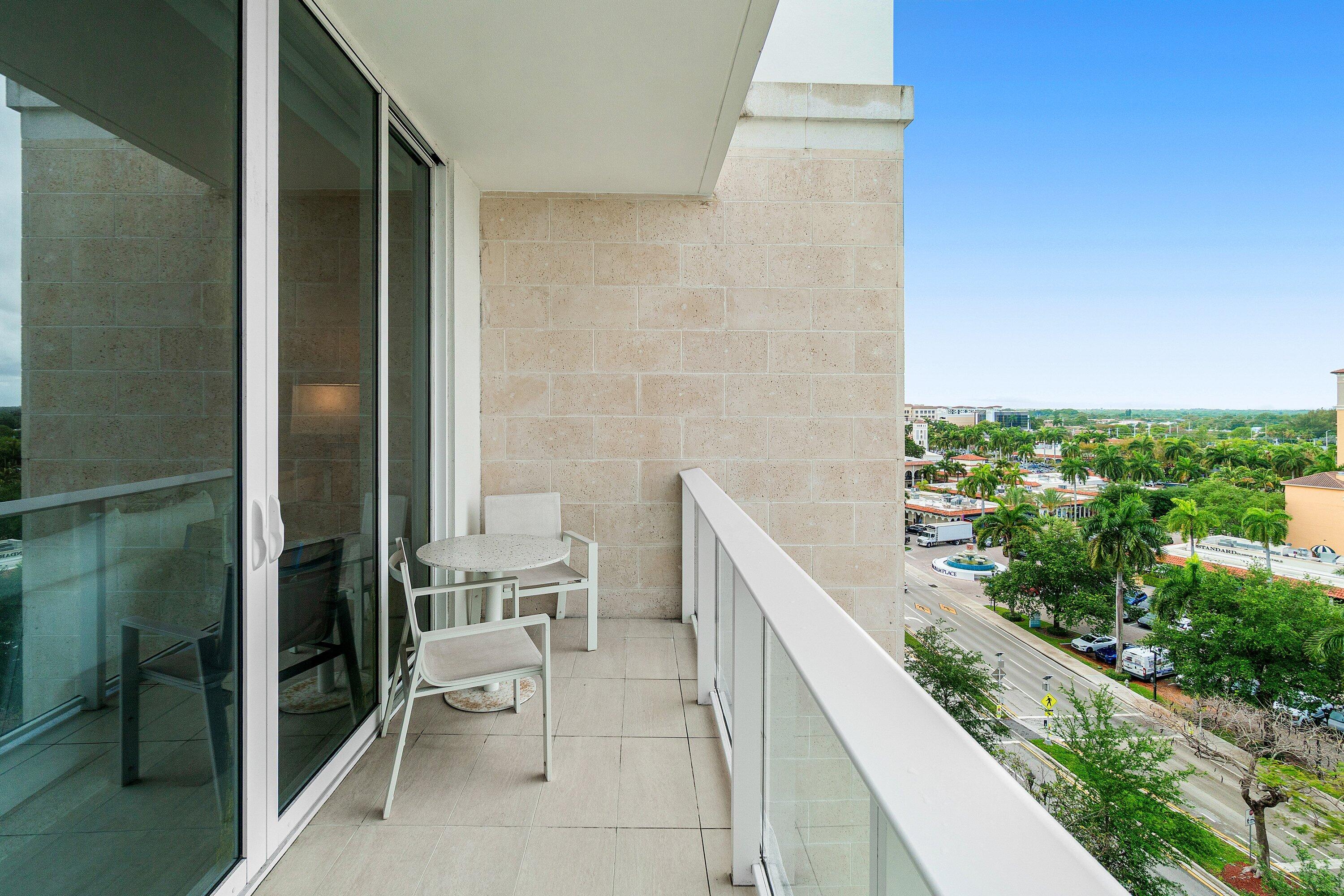 200 Southeast Mizner Boulevard, Unit 810 Boca Raton, FL 33432 - Photo 27 of 29 a bathroom with a toilet and a shower