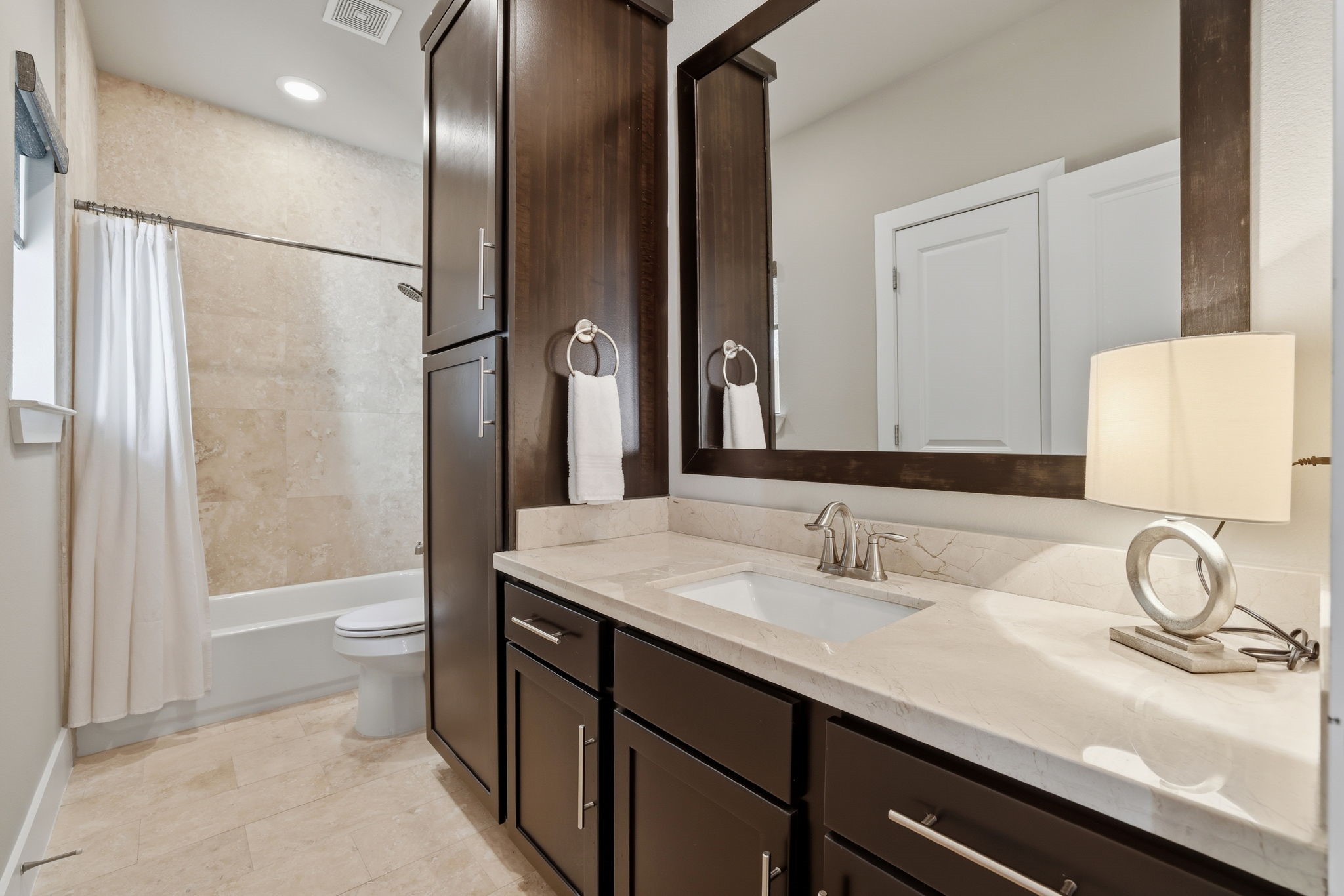 4102 Marina Street Houston, TX 77007 - Photo 4 of 32 Guest bathroom downstairs with expansive walk-in shower.