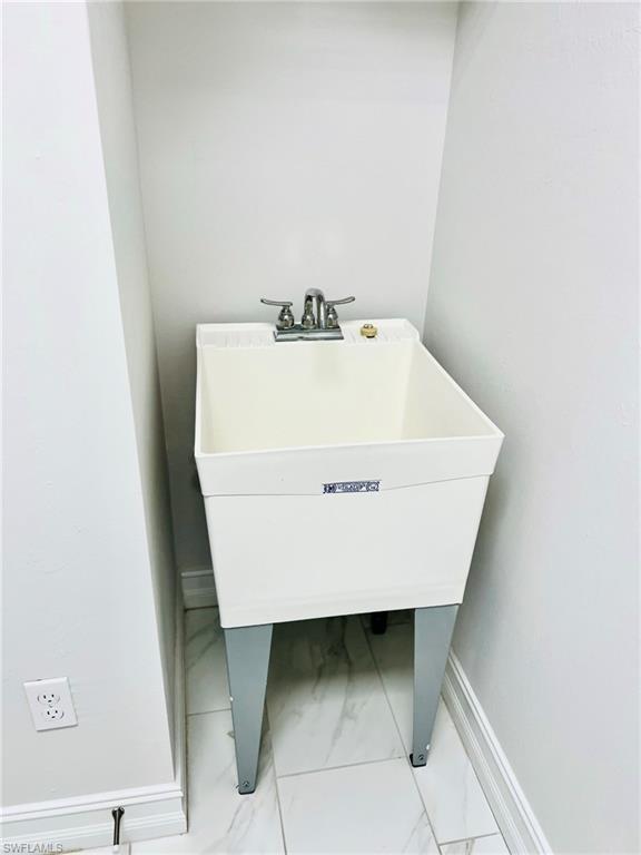 7841 Bristol Circle Naples, FL 34120 - Photo 21 of 31 Bathroom view of baseboards