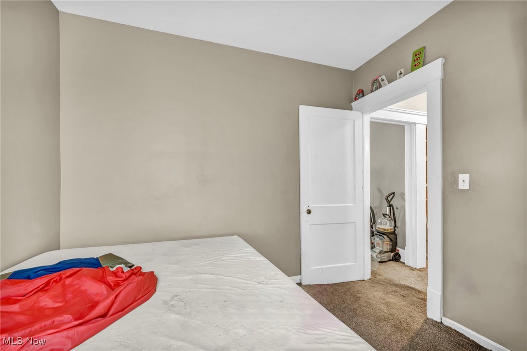 872 Rondel Road Cleveland, OH 44110 - Photo 13 of 25 View of carpeted bedroom