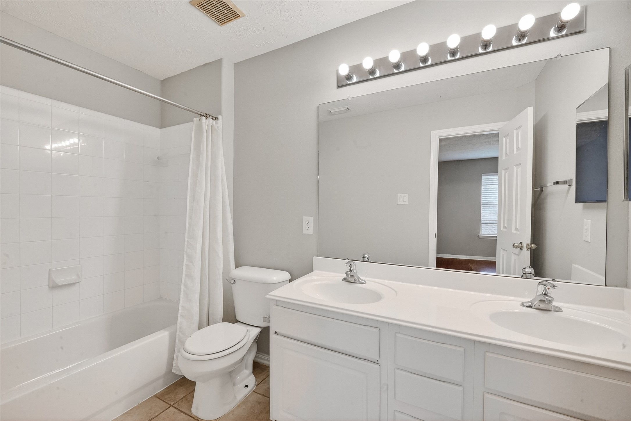 14308 Rocky Briar Lane Rosharon, TX 77583 - Photo 36 of 46 a bathroom with a sink a toilet and shower