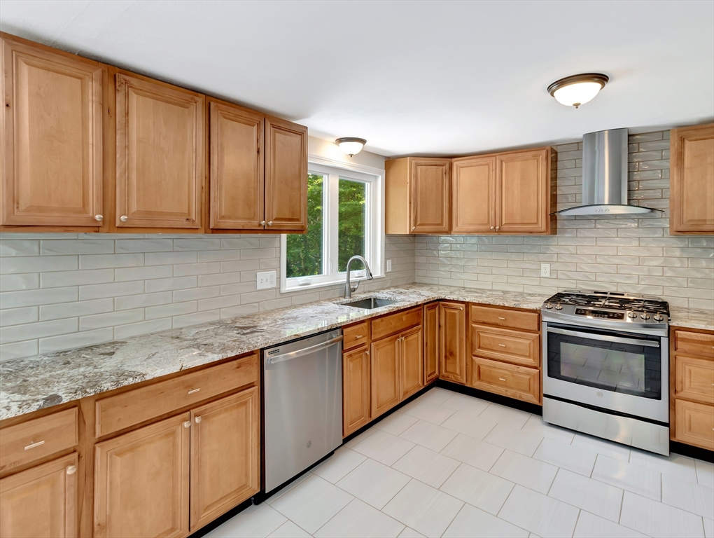 4 Gary Road Norton, MA 02766 - Photo 11 of 42 a kitchen with granite countertop cabinets stainless steel appliances and a sink