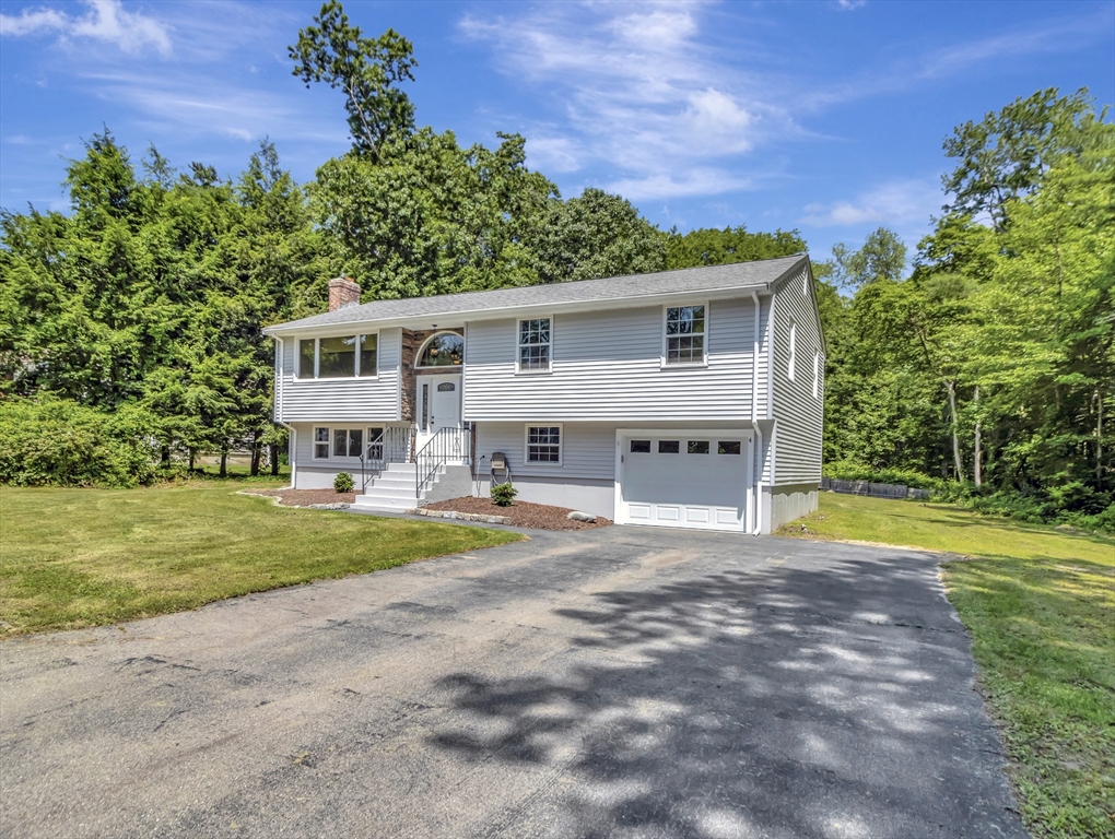 4 Gary Road Norton, MA 02766 - Photo 3 of 42 a view of a house with pool and a yard