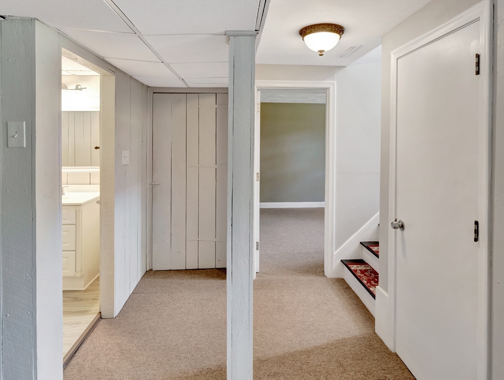 4 Gary Road Norton, MA 02766 - Photo 34 of 42 a view of a hallway to closet and a yard