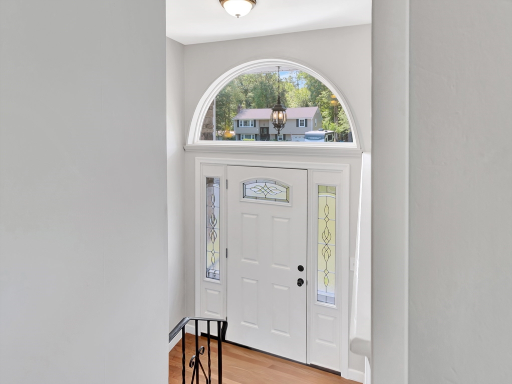 4 Gary Road Norton, MA 02766 - Photo 6 of 42 a view of a livingroom with a window and wooden floor
