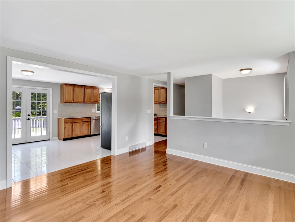 4 Gary Road Norton, MA 02766 - Photo 9 of 42 a view of a big room with wooden floor and windows