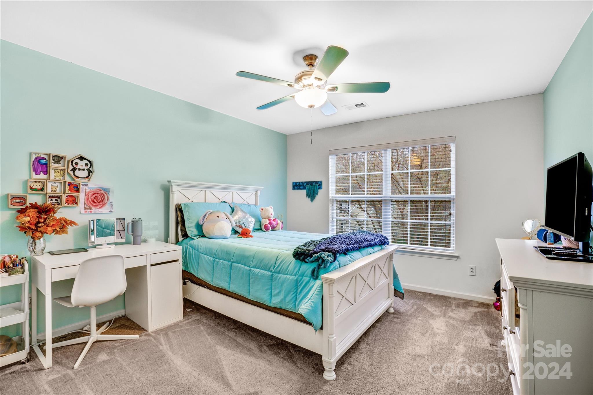 14432 Whistling Swan Road Charlotte, NC 28278 - Photo 17 of 28 a bedroom with a bed and a window