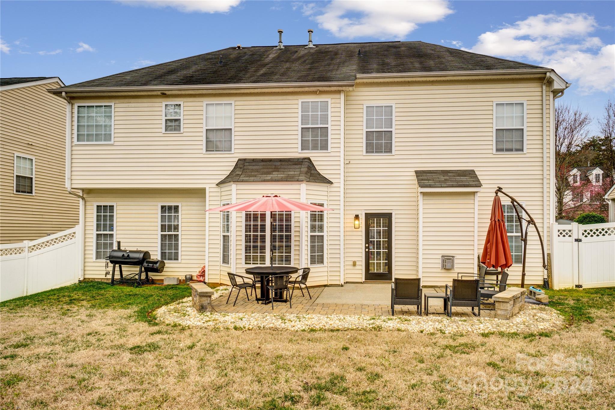 14432 Whistling Swan Road Charlotte, NC 28278 - Photo 24 of 28 a front view of a house with a patio