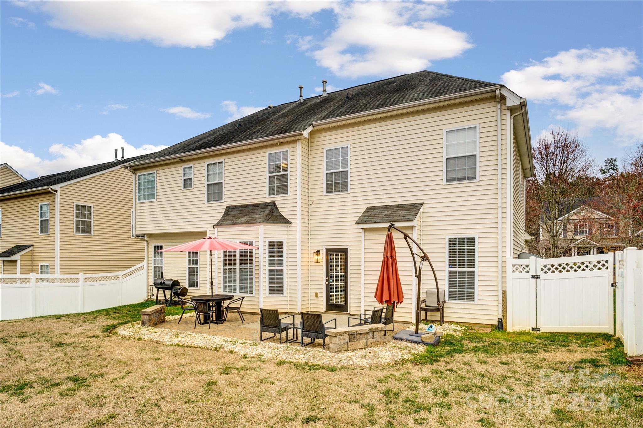 14432 Whistling Swan Road Charlotte, NC 28278 - Photo 25 of 28 a front view of a house with a yard