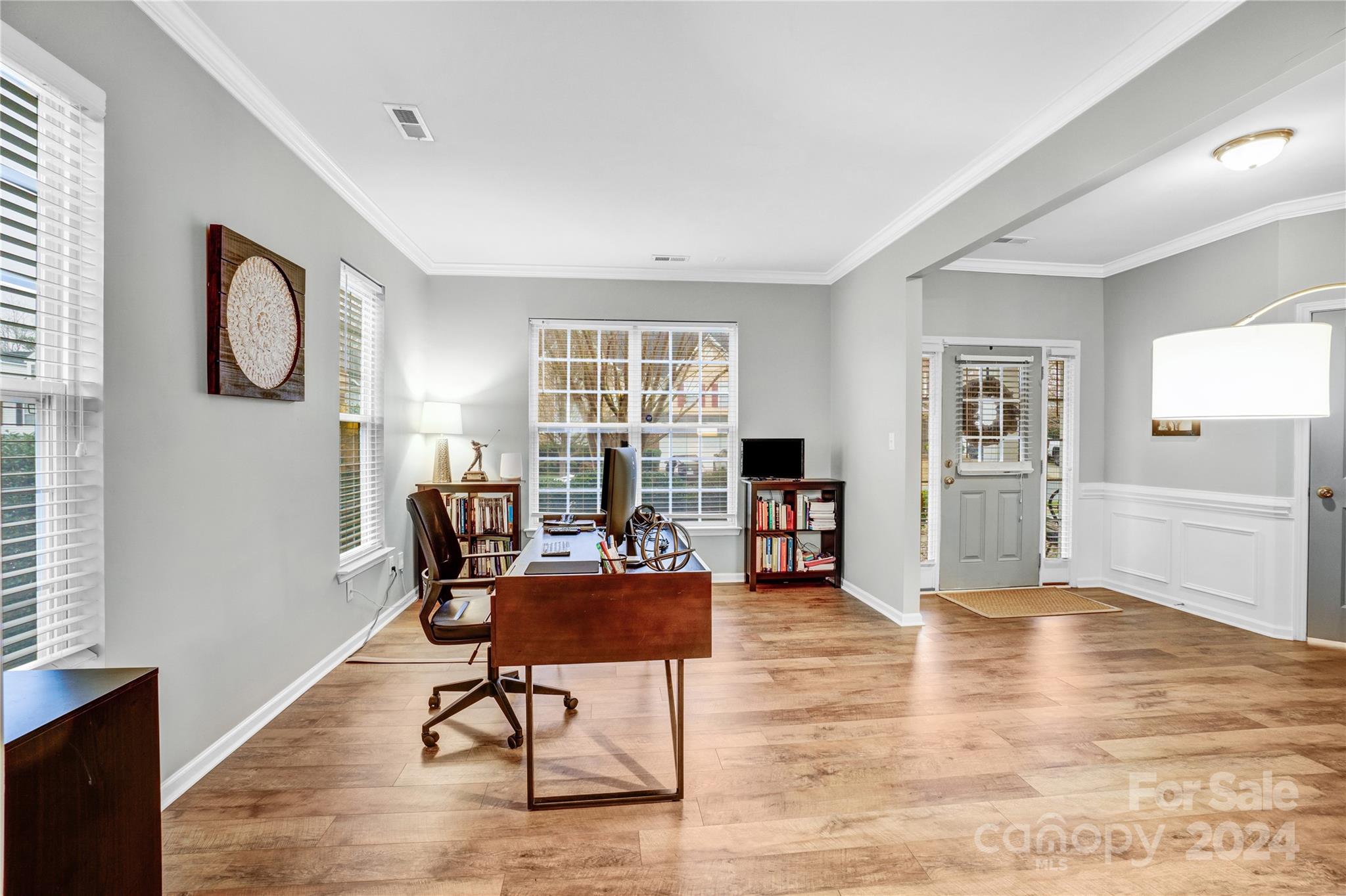 14432 Whistling Swan Road Charlotte, NC 28278 - Photo 4 of 28 a living room with furniture and wooden floor