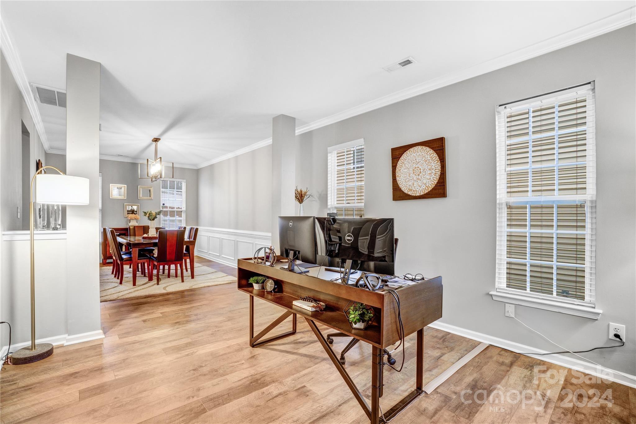 14432 Whistling Swan Road Charlotte, NC 28278 - Photo 5 of 28 a work room with furniture and a window