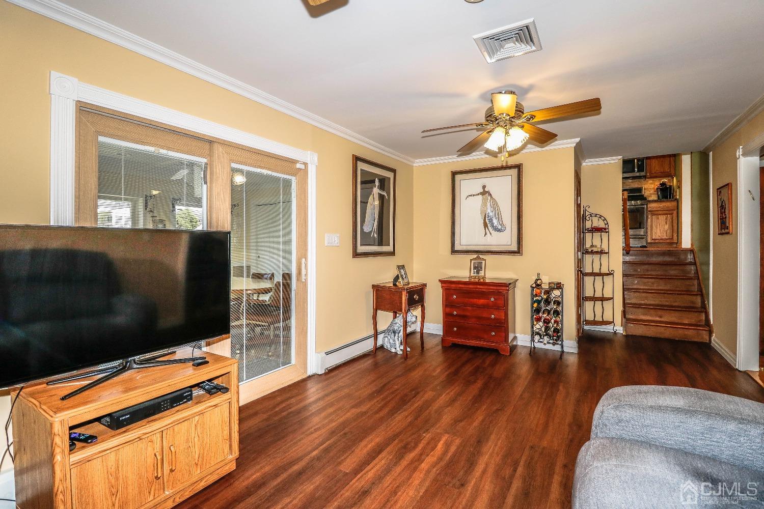 5 Pendleton Place Edison, NJ 08820 - Photo 7 of 37 a living room with furniture and a flat screen tv