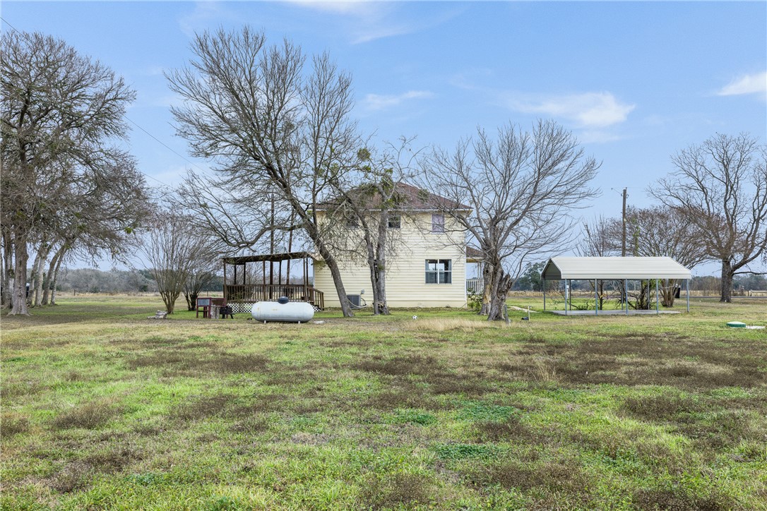 1172 County Road 268 Somerville, TX 77879 - Photo 11 of 40 a tall tree in middle of green field
