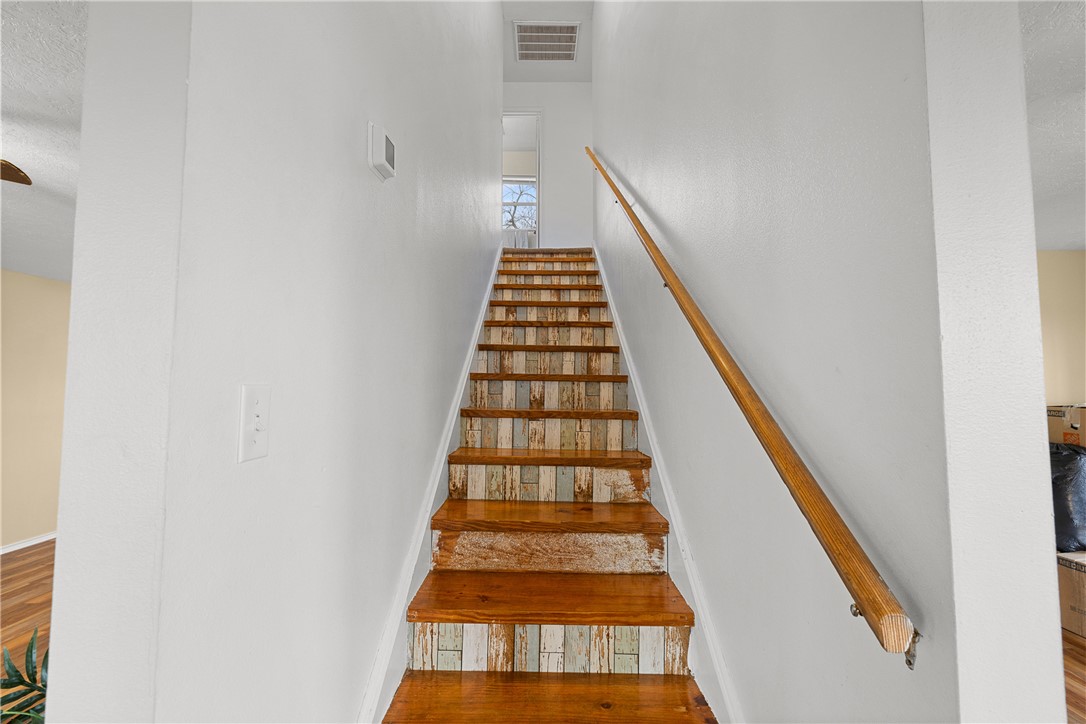 1172 County Road 268 Somerville, TX 77879 - Photo 24 of 40 a view of bedroom with wooden floor