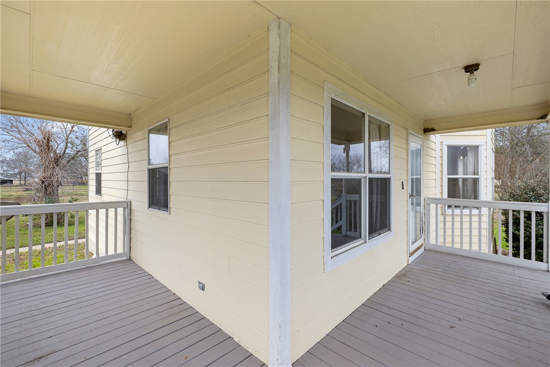 1172 County Road 268 Somerville, TX 77879 - Photo 30 of 40 a view of a balcony with wooden floor